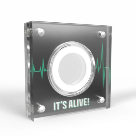 Transparent speaker with heartbeat design, 'It's Alive' text.