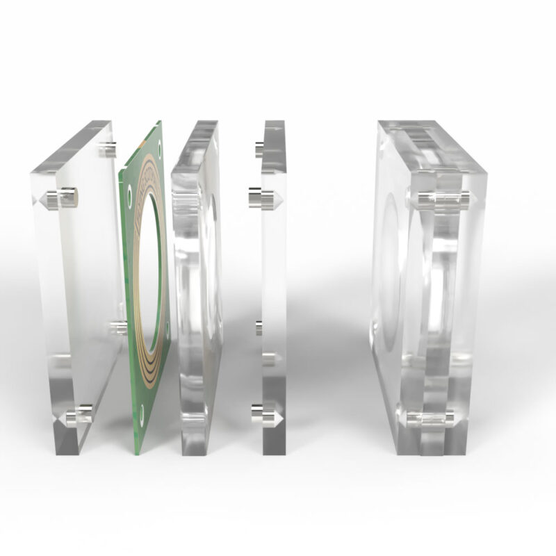 Exploded view of transparent electronic component assembly.